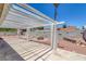 Backyard patio with a pergola and firepit at 6808 Waterhen Cir, Las Vegas, NV 89108