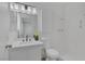 Well-lit bathroom with modern sink, countertop, and vanity at 6808 Waterhen Cir, Las Vegas, NV 89108