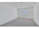 Cozy bedroom with plush carpeting and bright window at 6808 Waterhen Cir, Las Vegas, NV 89108