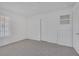 Spacious bedroom featuring a built-in shelving and closet for ample storage at 6808 Waterhen Cir, Las Vegas, NV 89108