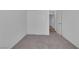 Bedroom with neutral carpet and a closet featuring bi-fold doors at 6808 Waterhen Cir, Las Vegas, NV 89108