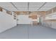 Spacious garage with storage cabinets and ample room for parking at 6808 Waterhen Cir, Las Vegas, NV 89108