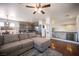 The living room has hardwood floors and flows into the kitchen, creating an open concept living space at 7021 Salt Marsh Ct, Las Vegas, NV 89148