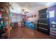 Organized pantry featuring shelves, storage bins, and bottled water, ensuring a well-stocked and tidy storage area at 7021 Salt Marsh Ct, Las Vegas, NV 89148