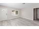 Living room featuring updated flooring, and natural light through the window at 7144 Forest Vista St, Las Vegas, NV 89147