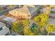 Aerial view of a sprawling property with a pool, putting green, and lush landscaping, highlighting its luxurious features at 7258 Sashaying Spirit Ct, Las Vegas, NV 89131