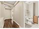 Elegant bathroom with modern fixtures, neutral walls, and wood-look flooring at 7258 Sashaying Spirit Ct, Las Vegas, NV 89131