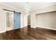 Large bedroom with a barn door leading into bathroom with modern shower at 7258 Sashaying Spirit Ct, Las Vegas, NV 89131