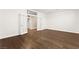 Bright, large bonus room featuring wood flooring and multiple windows at 7258 Sashaying Spirit Ct, Las Vegas, NV 89131