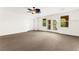 Bright bonus room with ample natural light from large windows and doors at 7258 Sashaying Spirit Ct, Las Vegas, NV 89131