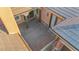 A view of the courtyard with stone floors, a porch with columns, and a doormat at 7258 Sashaying Spirit Ct, Las Vegas, NV 89131