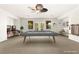 Spacious game room featuring a pool table and pinball machines at 7258 Sashaying Spirit Ct, Las Vegas, NV 89131