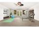 Spacious home gym equipped with modern exercise equipment and natural light at 7258 Sashaying Spirit Ct, Las Vegas, NV 89131