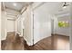 Hallway with hardwood floors leading to bedroom and bathroom at 7258 Sashaying Spirit Ct, Las Vegas, NV 89131