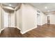 Hallway with hardwood floors connecting to rooms, enhanced with recessed lighting at 7258 Sashaying Spirit Ct, Las Vegas, NV 89131