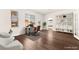 Bright home office with sleek desk, modern shelving and cozy armchairs at 7258 Sashaying Spirit Ct, Las Vegas, NV 89131