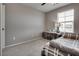 Bedroom features neutral walls, carpet, a window and a queen-size bed at 7559 Chimney Point Ct, Las Vegas, NV 89166