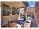 Relaxing covered patio with stylish outdoor seating, a heater, and a private hot tub, perfect for year-round enjoyment at 7559 Chimney Point Ct, Las Vegas, NV 89166