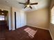 Comfortable bedroom featuring a ceiling fan and closet at 7604 Cruz Bay Ct, Las Vegas, NV 89128