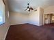 Spacious bedroom featuring large windows, neutral walls, and a stylish ceiling fan at 7604 Cruz Bay Ct, Las Vegas, NV 89128