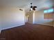 Large bedroom with a ceiling fan, and neutral color palette at 7604 Cruz Bay Ct, Las Vegas, NV 89128