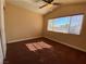 Bright bedroom with ample sunlight from the large window at 7604 Cruz Bay Ct, Las Vegas, NV 89128