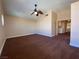 Spacious bedroom with a ceiling fan, and neutral color palette at 7604 Cruz Bay Ct, Las Vegas, NV 89128