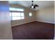Comfortable bedroom featuring natural light from large windows, and neutral paint at 7604 Cruz Bay Ct, Las Vegas, NV 89128