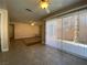 Open dining area with tile floors and sliding glass doors leading to the backyard at 7604 Cruz Bay Ct, Las Vegas, NV 89128
