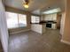 Spacious eat-in kitchen with natural light and access to outdoor patio at 7604 Cruz Bay Ct, Las Vegas, NV 89128