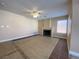 Bright living room featuring a fireplace and lots of natural light from the window at 7604 Cruz Bay Ct, Las Vegas, NV 89128