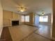 Spacious living room with tile flooring, fireplace, and great natural light at 7604 Cruz Bay Ct, Las Vegas, NV 89128