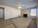 Inviting living room with fireplace and neutral tile floors at 7604 Cruz Bay Ct, Las Vegas, NV 89128