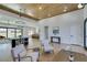 Expansive living area with modern décor, stylish lighting, a wood ceiling, and an inviting atmosphere at 8713 Litchfield Ave, Las Vegas, NV 89134