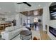 Bright living room with wood ceiling, hardwood floors, and modern fireplace at 8713 Litchfield Ave, Las Vegas, NV 89134