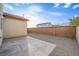 Fenced backyard with concrete and gravel landscaping at 9146 Grand Sunburst Ct, Las Vegas, NV 89149