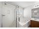 Bright bathroom featuring a shower, soaking tub, and vanity, perfect for relaxation at 9146 Grand Sunburst Ct, Las Vegas, NV 89149