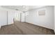 An open bedroom with an open closet, plush carpet, and neutral tones create a serene atmosphere at 9146 Grand Sunburst Ct, Las Vegas, NV 89149