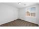 Bedroom featuring neutral carpet, base trim, and a double door closet at 9146 Grand Sunburst Ct, Las Vegas, NV 89149