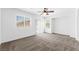 Spacious bedroom with carpet flooring, natural light, and a sliding glass door to the backyard at 9146 Grand Sunburst Ct, Las Vegas, NV 89149