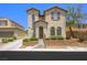 Charming two-story home with a well-manicured front yard and neutral stucco exterior at 9146 Grand Sunburst Ct, Las Vegas, NV 89149