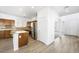 Bright kitchen featuring wood cabinets, stainless appliances, and light countertops with modern backsplash at 9146 Grand Sunburst Ct, Las Vegas, NV 89149