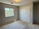Bedroom with closet and natural light from the exterior window at 9165 Beauchamp Ave, Las Vegas, NV 89148