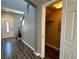 Entryway featuring modern wood-look floors and an entry closet at 9165 Beauchamp Ave, Las Vegas, NV 89148