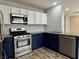 Modern kitchen with stainless steel appliances and plenty of counter space at 9165 Beauchamp Ave, Las Vegas, NV 89148