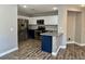 Well-lit kitchen with stainless steel appliances and two-tone cabinets at 9165 Beauchamp Ave, Las Vegas, NV 89148