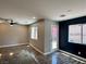 Open living room showcasing modern wood-look floors and natural light at 9165 Beauchamp Ave, Las Vegas, NV 89148