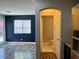 Open living space leading to a bathroom with a view at 9165 Beauchamp Ave, Las Vegas, NV 89148
