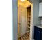 Pantry and half bath convenient to the kitchen at 9165 Beauchamp Ave, Las Vegas, NV 89148