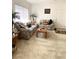 Bright living room featuring large windows, plush sofas, and a cozy atmosphere at 9470 Peace Way # 212, Las Vegas, NV 89147